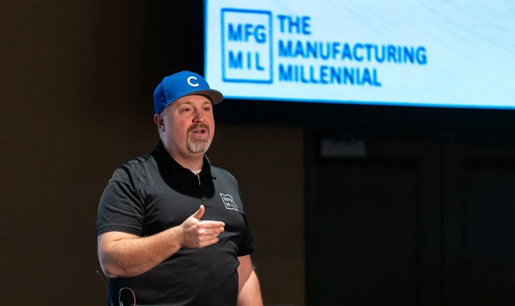 Jake Hall - the manufacturing millenial - gives a keynote presentation at an automation conference.