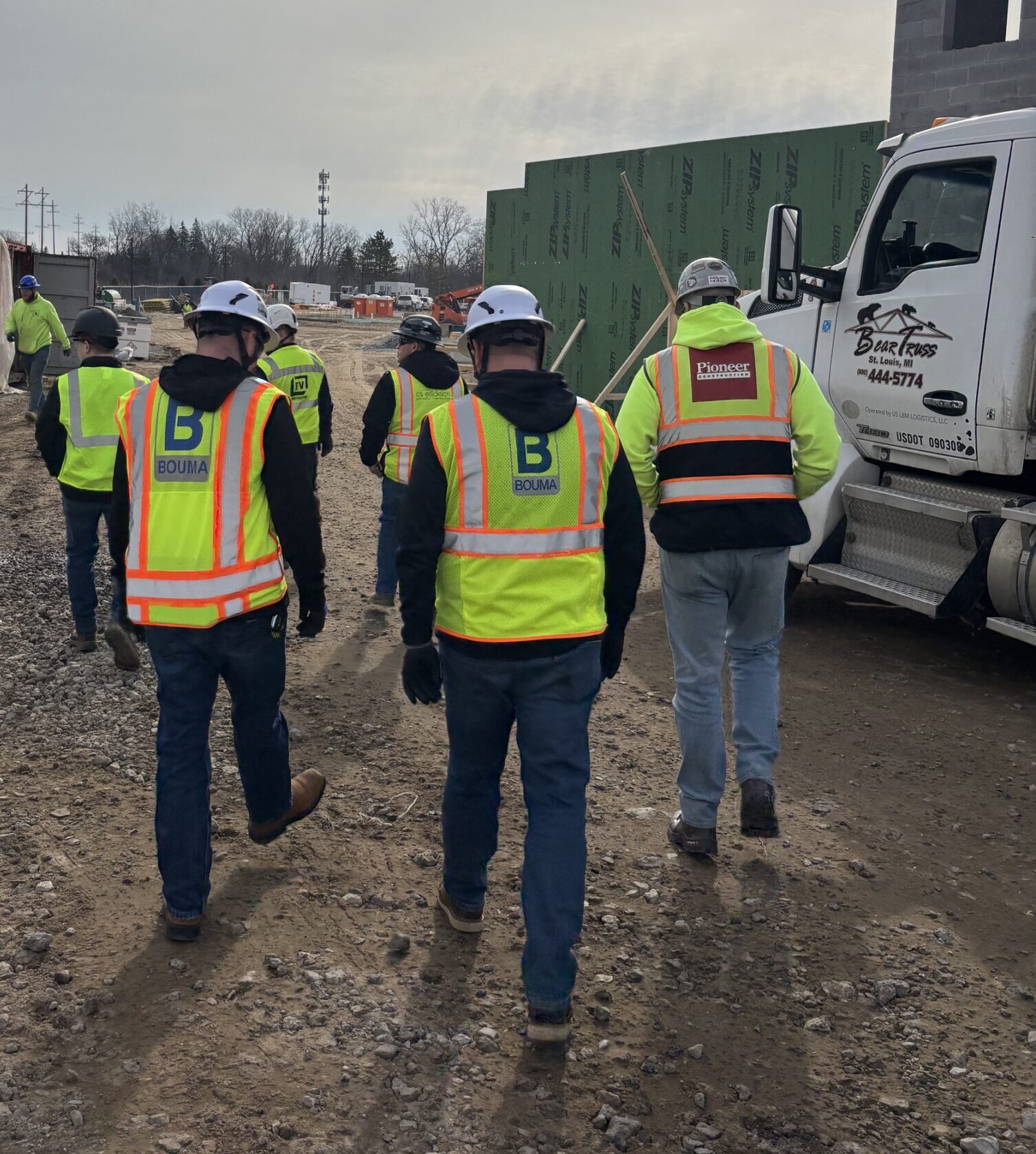 A group of ASAM members inspecting safety standards on a safety walk.